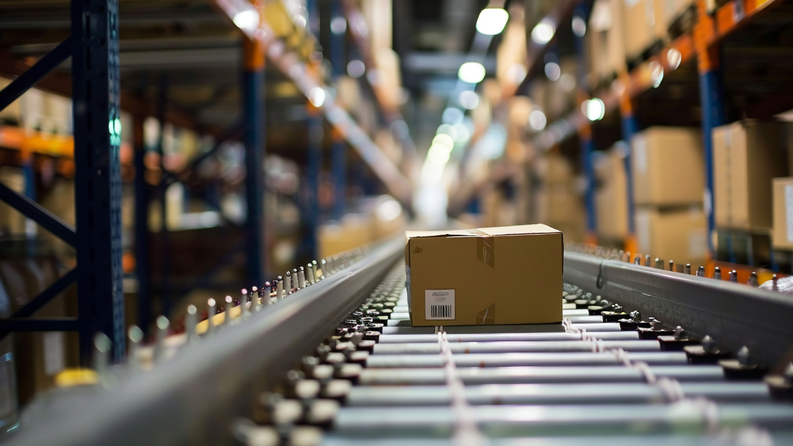 A parcel on a track in a warehouse