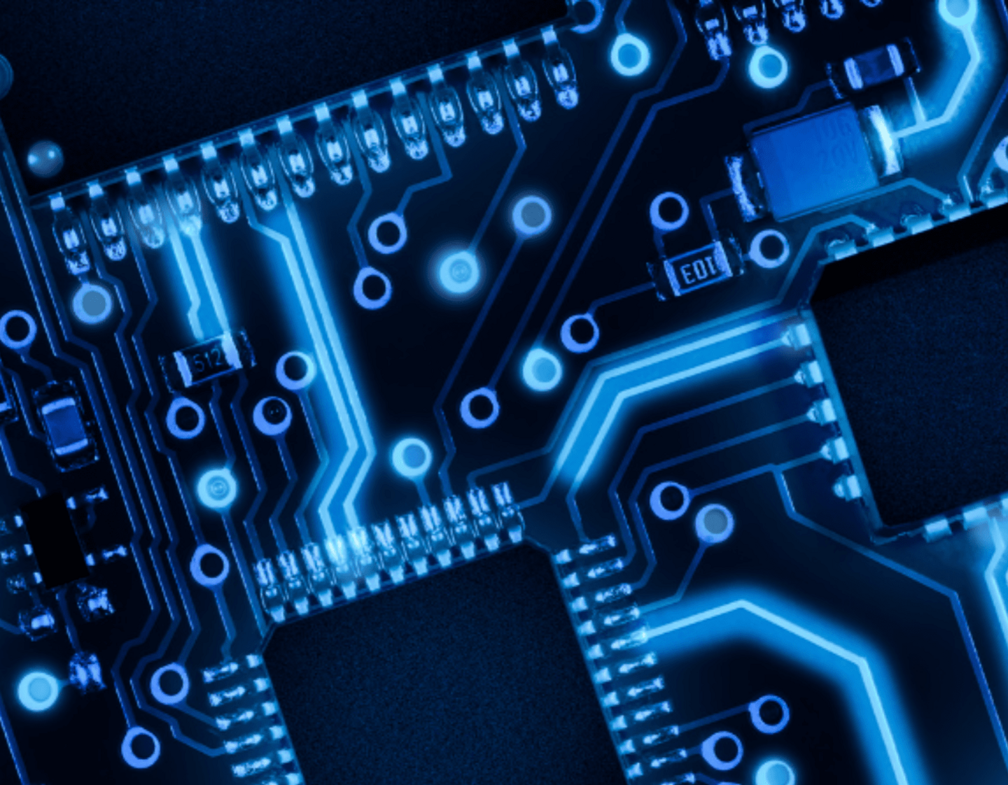 a close up shot of a blue coloured circuit-board