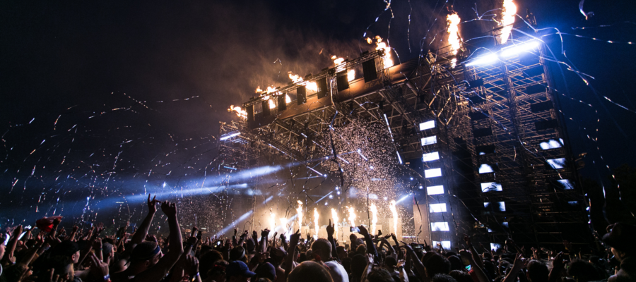 A crowd and a stage at an event