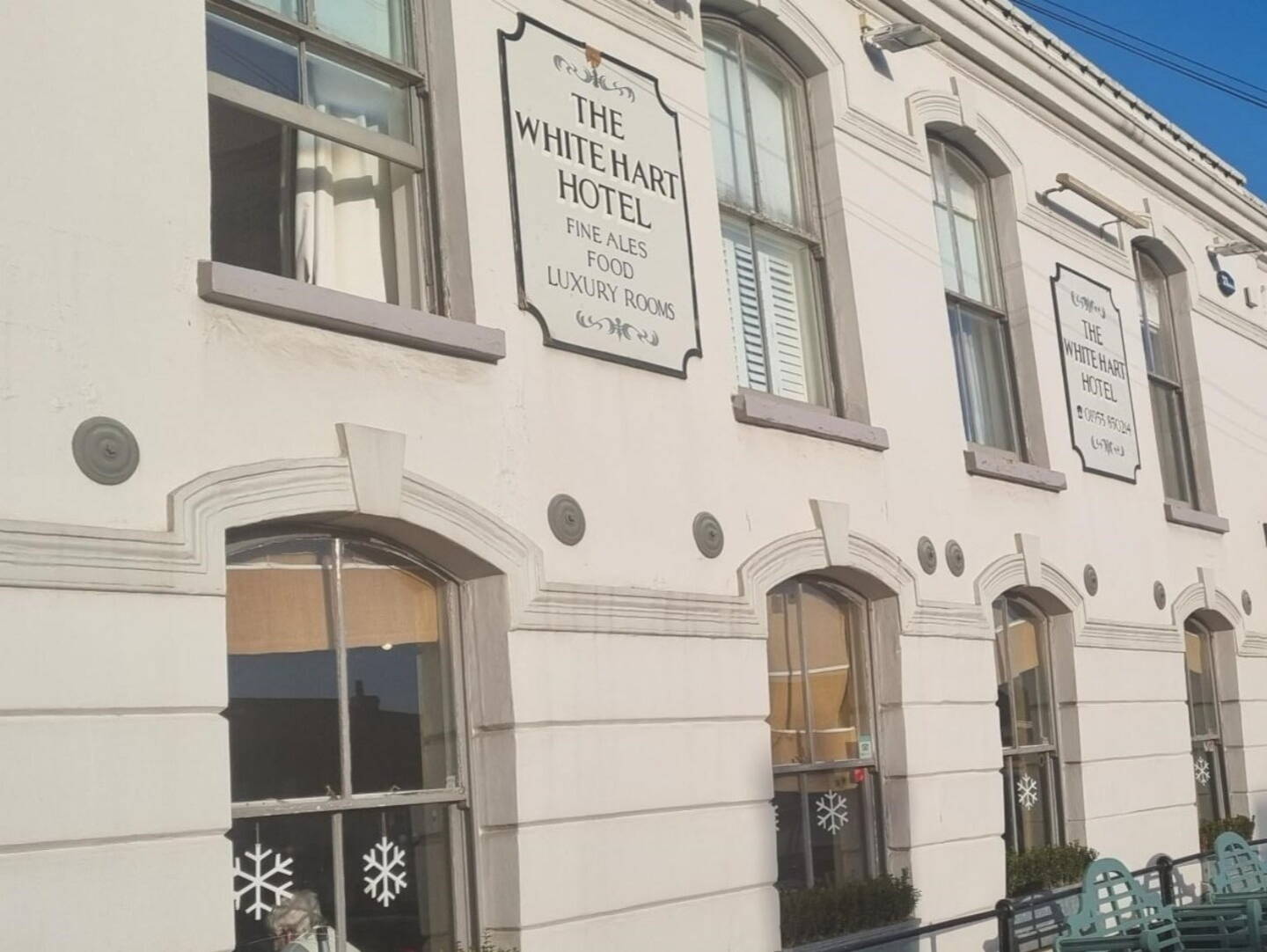 A shot of the White Hart Hotel from outside on a sunny day