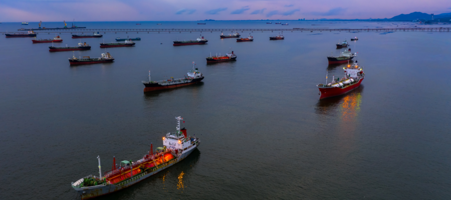 A fleet of oil transport ships in the ocean