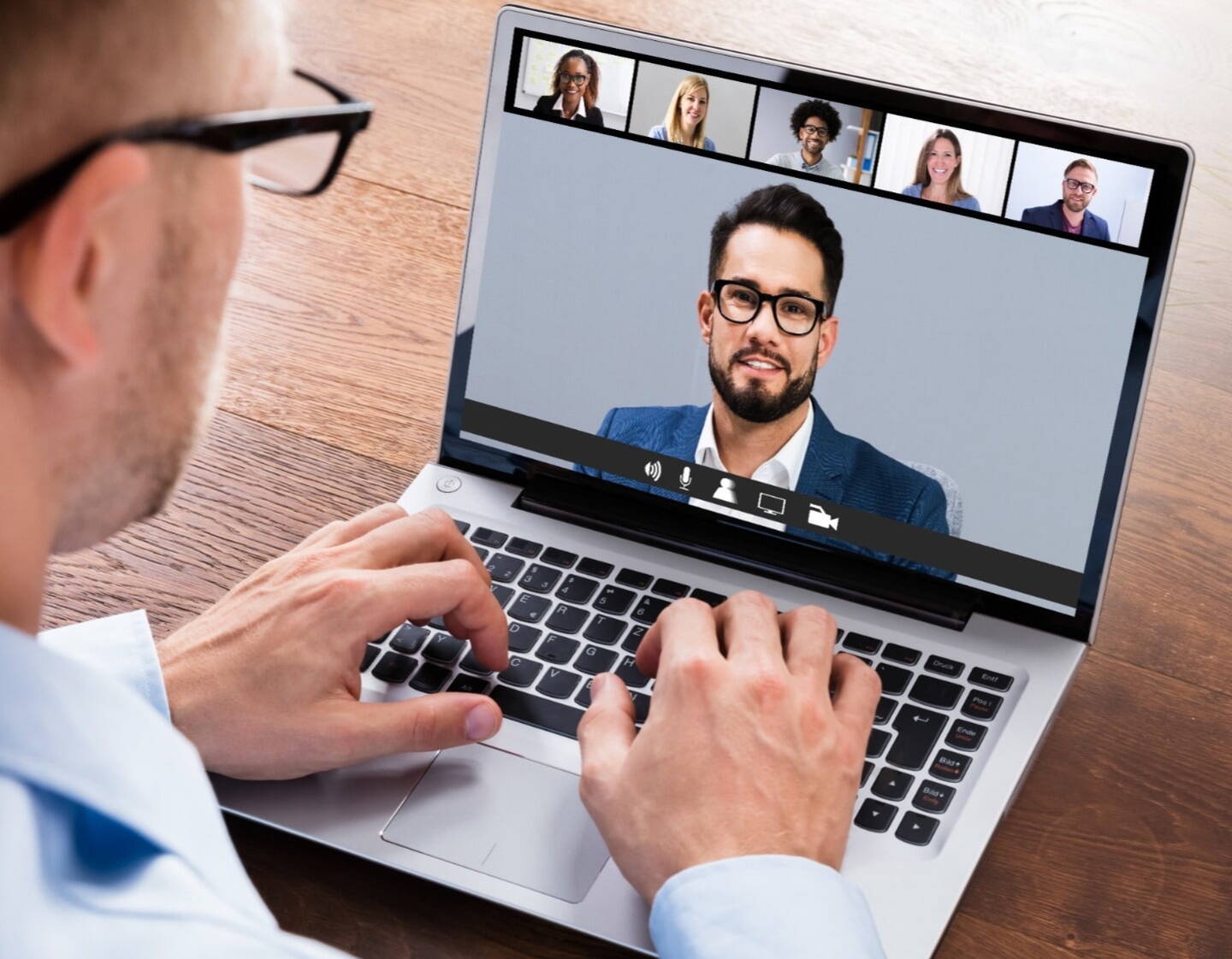 A video interview taking place on a laptop